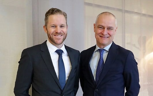 vinga-corporate-bond-stefan-gustav two men smiling